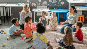 Children and adults playing in a circle
